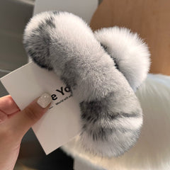 Trendy gray rabbit fur hair clip on displayed model