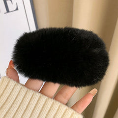 Cozy hair accessory featuring plush rabbit fur