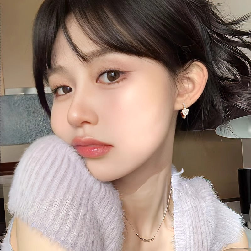 Elegant silver stud earrings on display