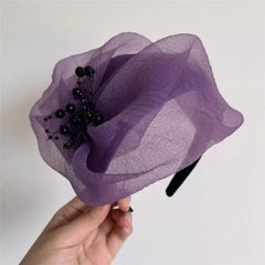 Stylish breathable half hat in purple being worn outdoors