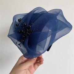 Stylish breathable half hat in red displayed on a head