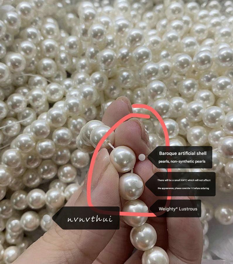 Pearl necklace with deep sea beads