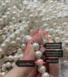 Pearl necklace with deep sea beads