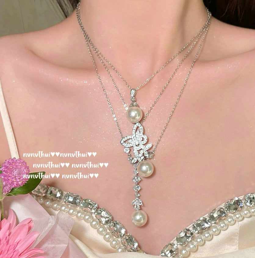 Adjustable length of butterfly pearl necklace