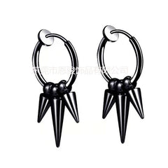 close up of titanium pointed studs earrings