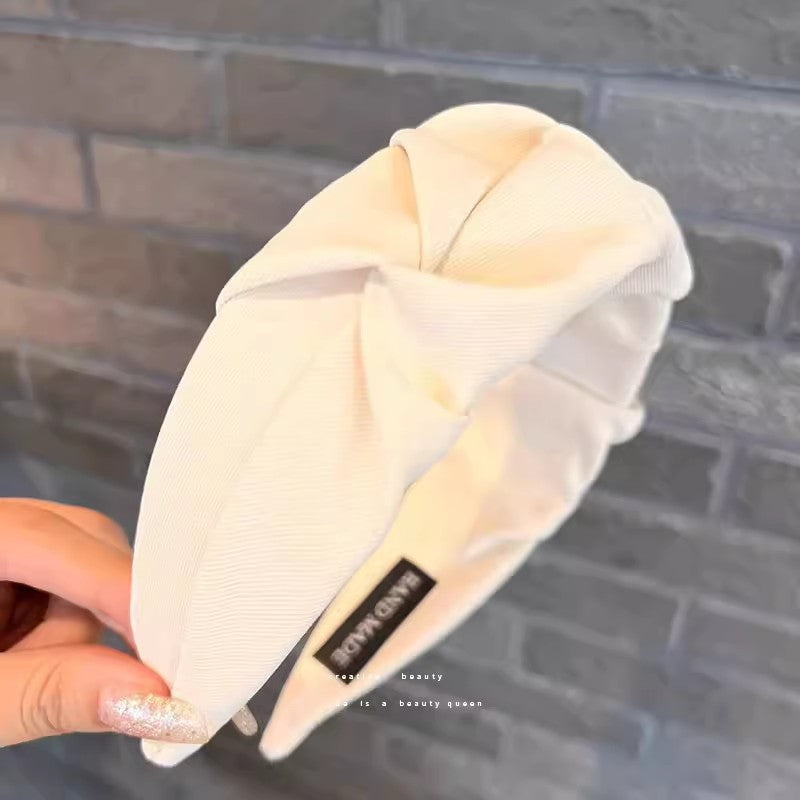 Stylish wrinkled wide hairband in beige colour
