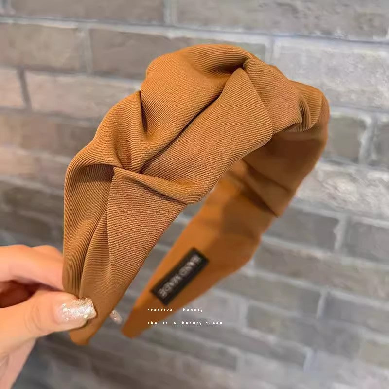 Stylish wide hairband in casual setting