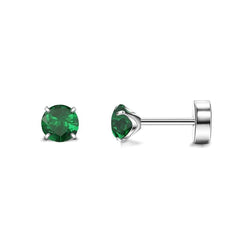 Fashionable stainless steel earrings on a neutral background