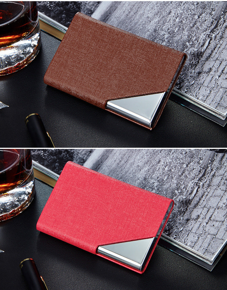Business card holder placed on a desk with cards