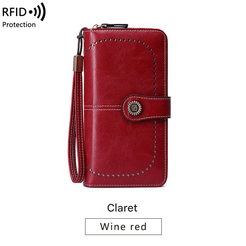 Spacious wallet with zip closure in wine red
