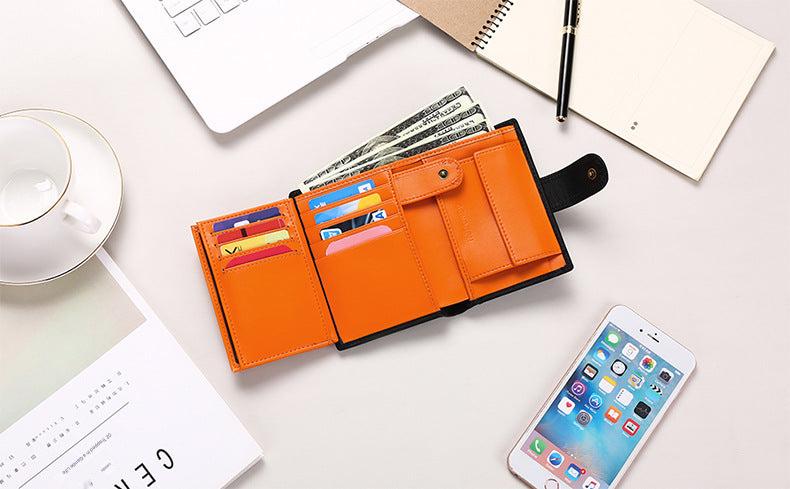 Textured black leather wallet with compact design
