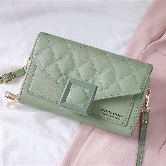 Stylish quilted mini shoulder bag in dark blue