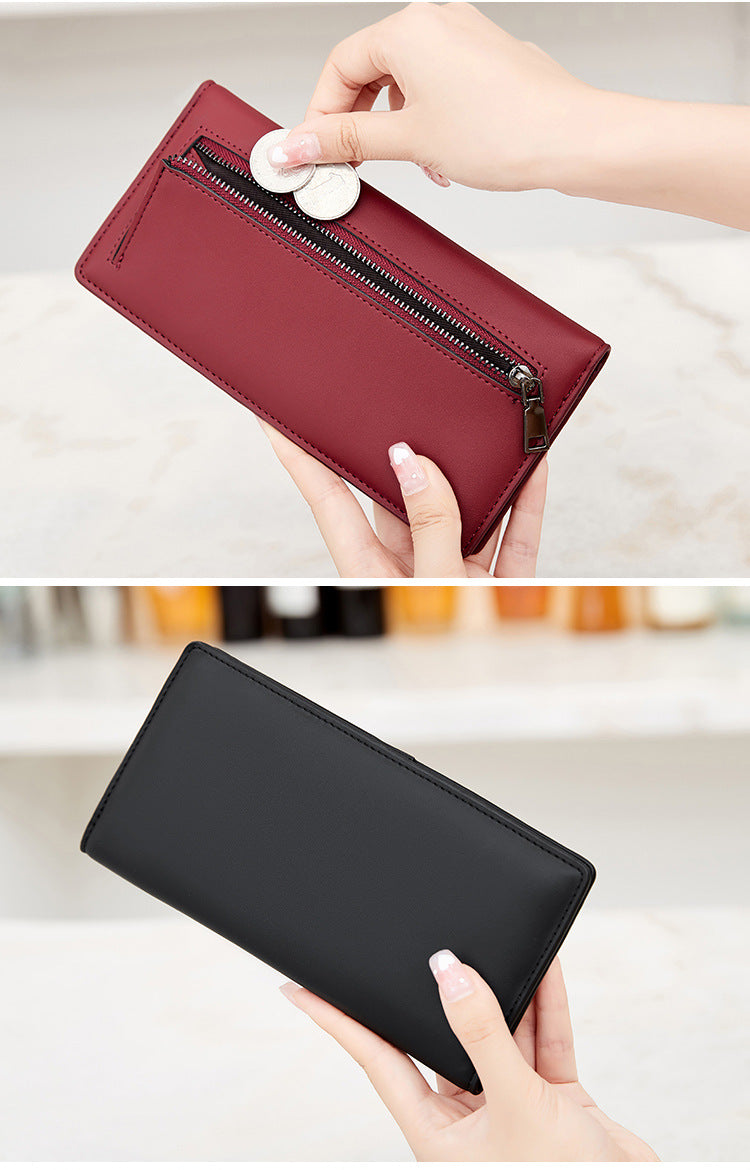 Black ultra-thin wallet showcasing cards