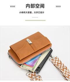 Purple shoulder bag against white background