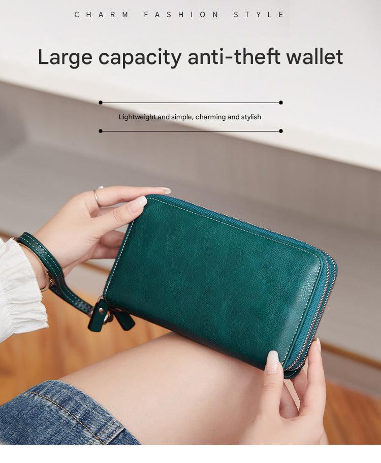 Stylish double-zip clutch wallet in Peacock Blue