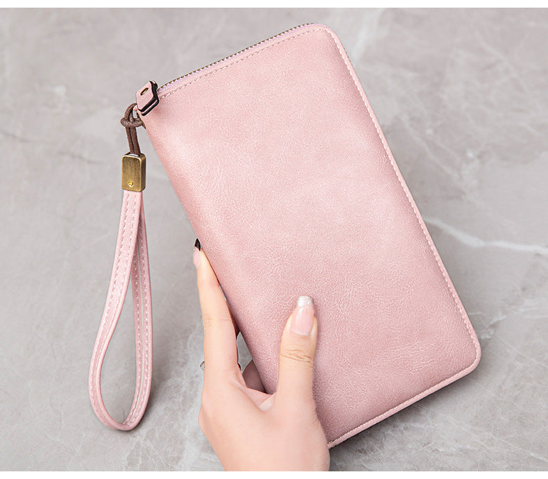 Spacious compartment of RFID-blocking wallet for women