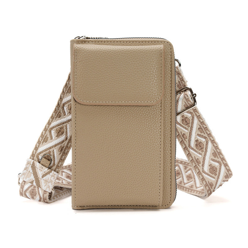 Crossbody bag showcasing interior compartments