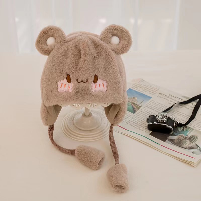 Adorable baby with ear protection hat