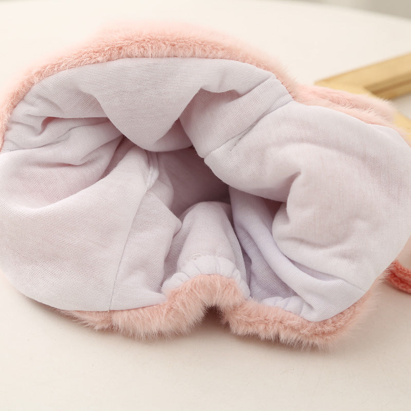 Front view of baby wearing Cozy Plush Hat
