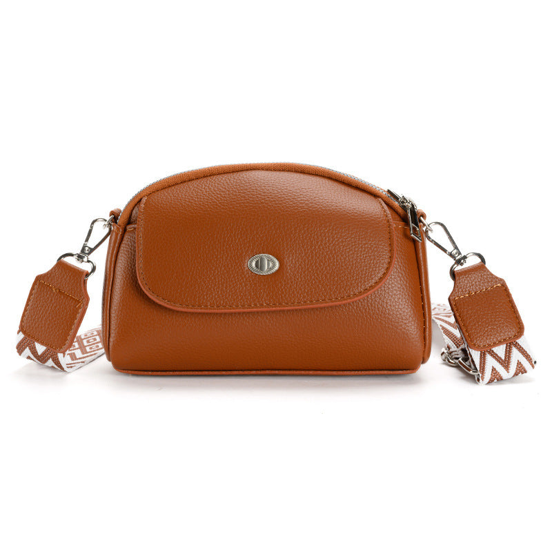 Inside view of women's shoulder bag with compartments