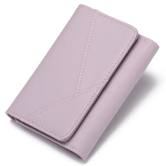 Organised compartments in women's tri-fold wallet