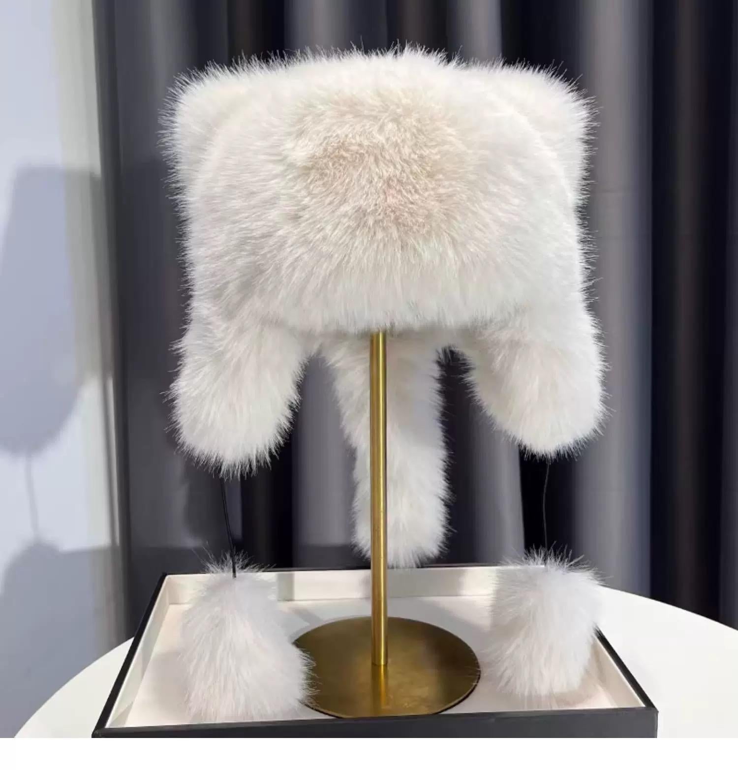Cute plush winter hat with bear ears hanging display