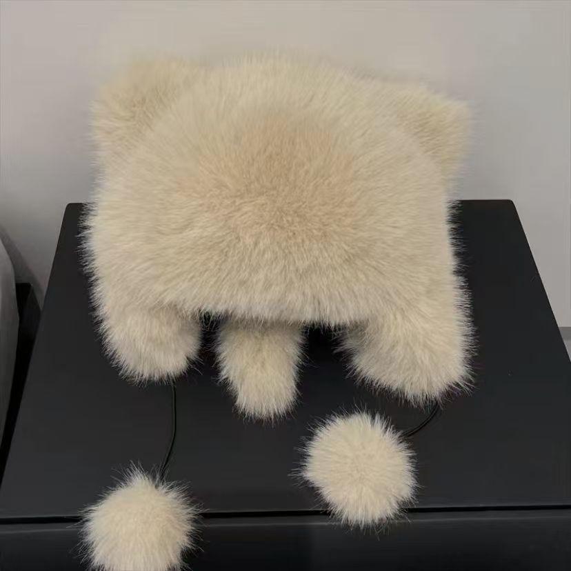 Cute plush winter hat with bear ears outside