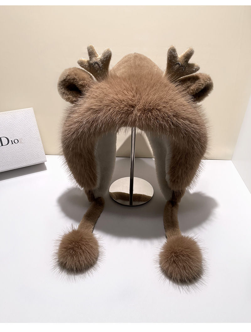 Woman wearing cute plush hat for winter