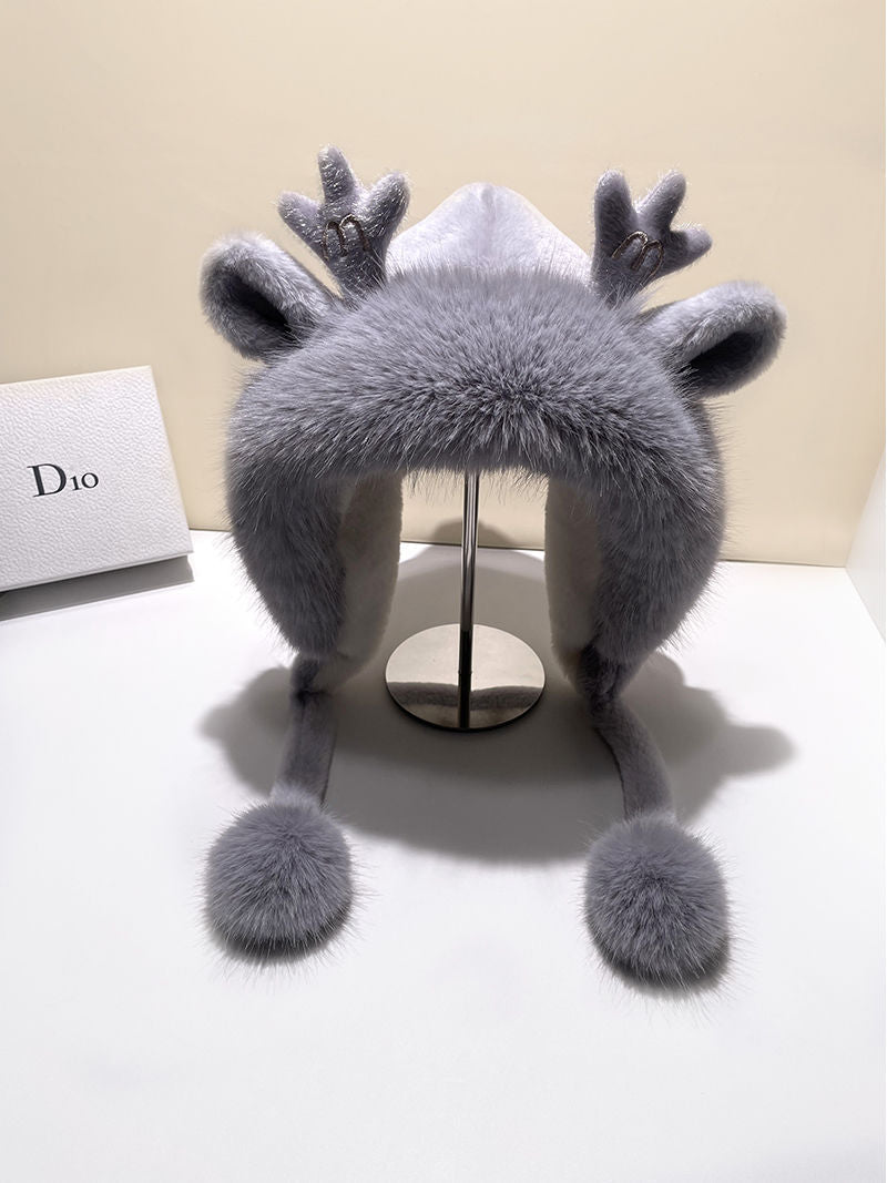 Winter hat with antlers on display