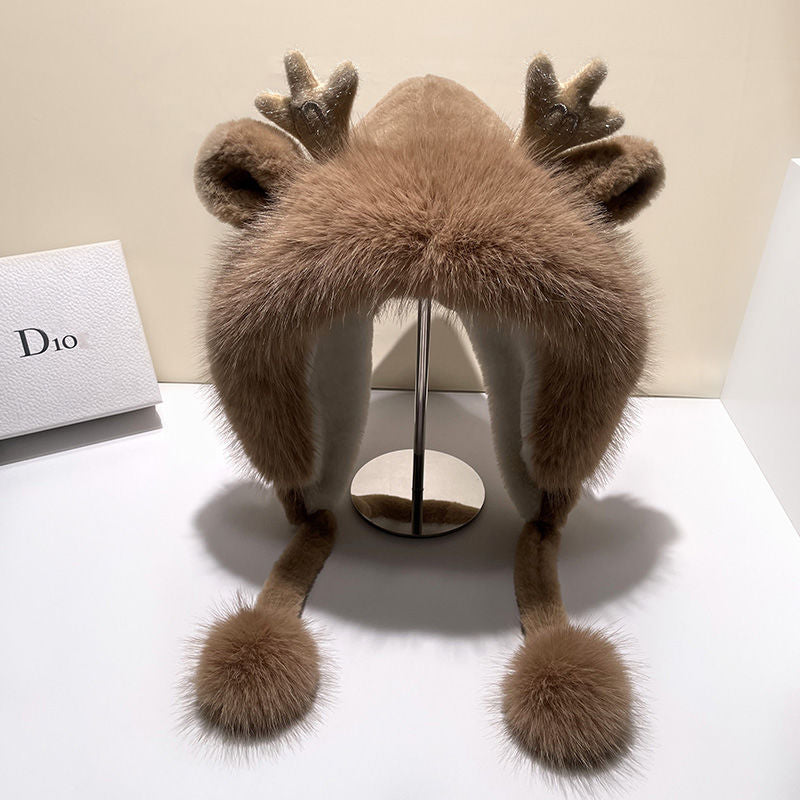 Woman wearing cute plush hat for winter