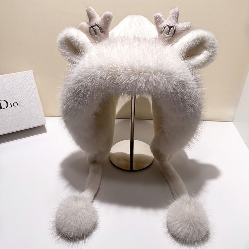 Winter hat with antlers on display