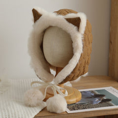 Stylish feminine fox ear hat in winter outdoor setting