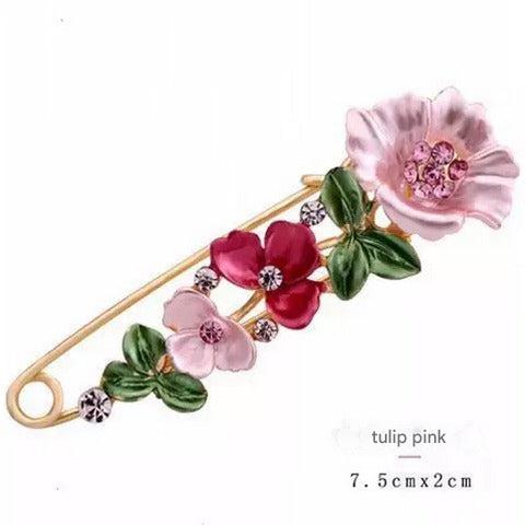 Heart-shaped brooch shining with colorful rhinestones