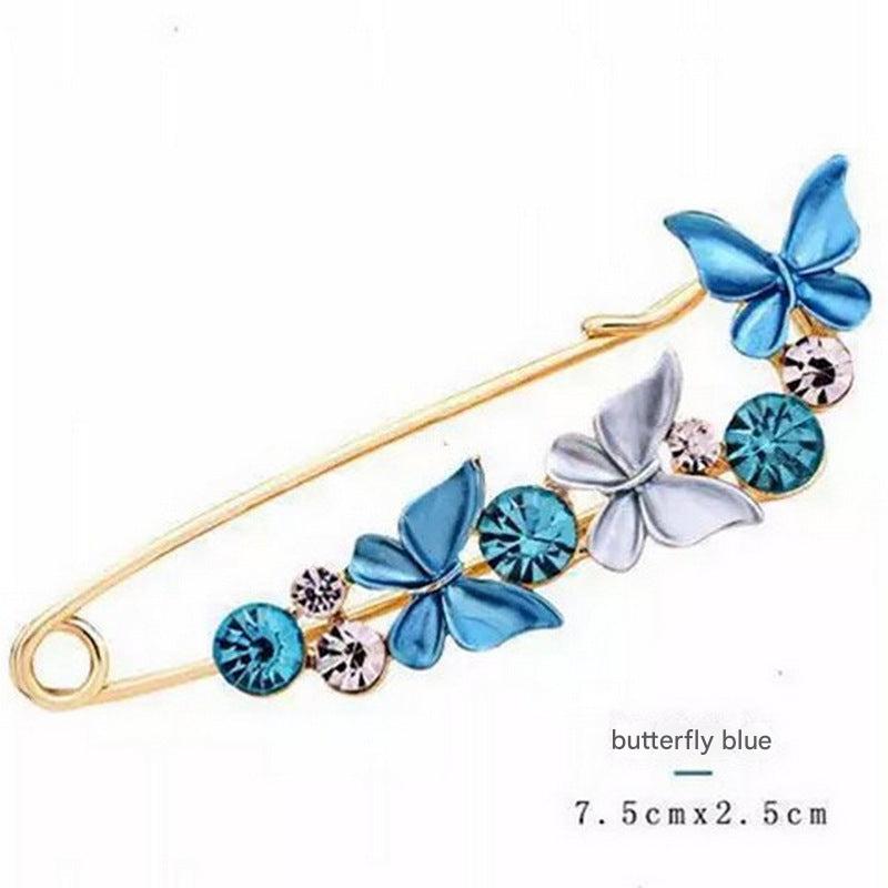 Chic brooch pinned on a stylish blouse
