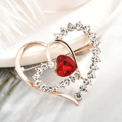 Heart-shaped brooch shining with colorful rhinestones