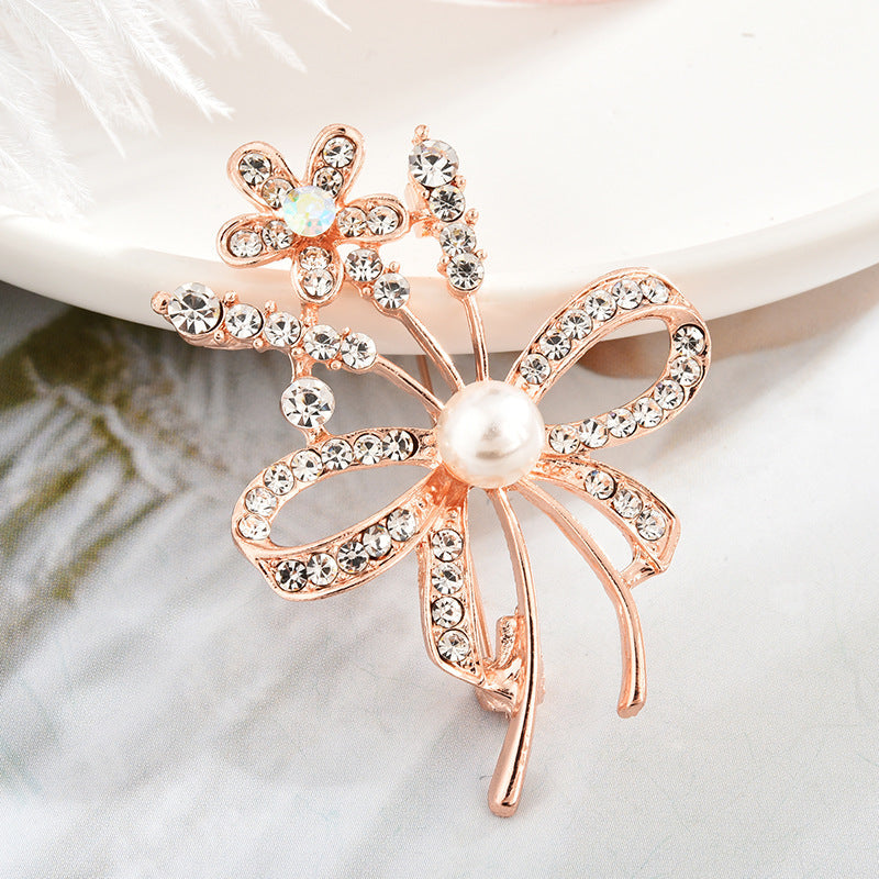 Versatile brooch attached to a vibrant scarf