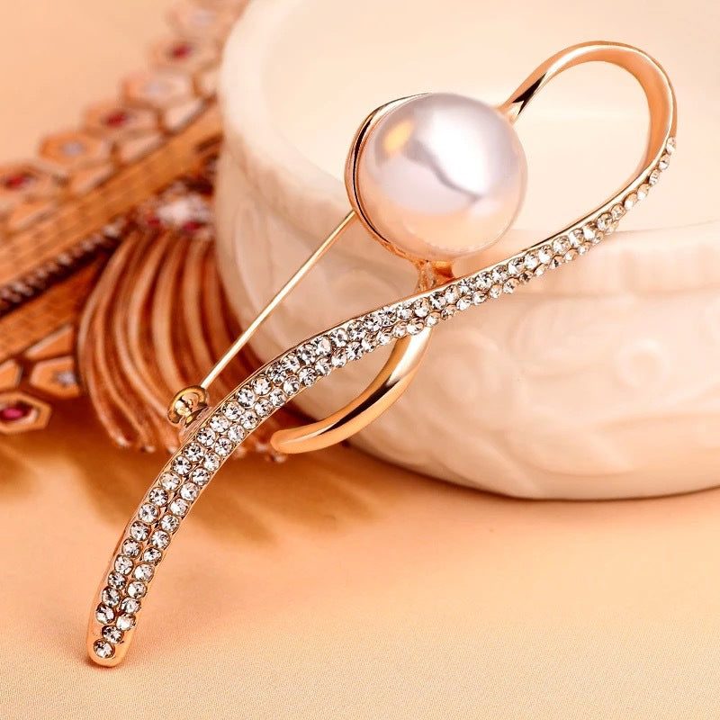 Elegant brooch placed on a table setting