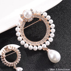Heart-shaped brooch shining with colorful rhinestones
