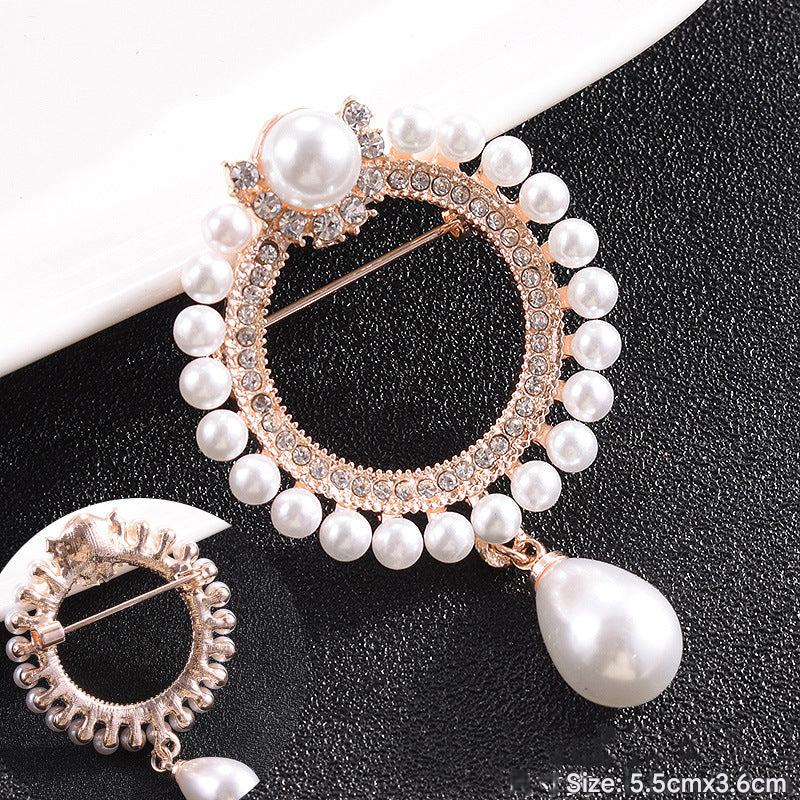 Heart-shaped brooch shining with colorful rhinestones