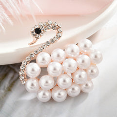 Close-up of intricate rhinestone detailing on brooch