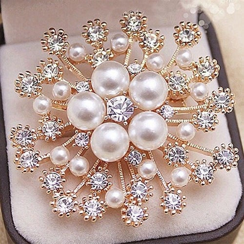 Elegant brooch placed on a table setting
