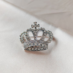 Elegant silver brooch with rhinestones