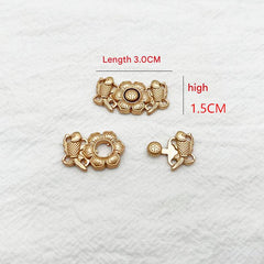 Metal clasp installation on clothing