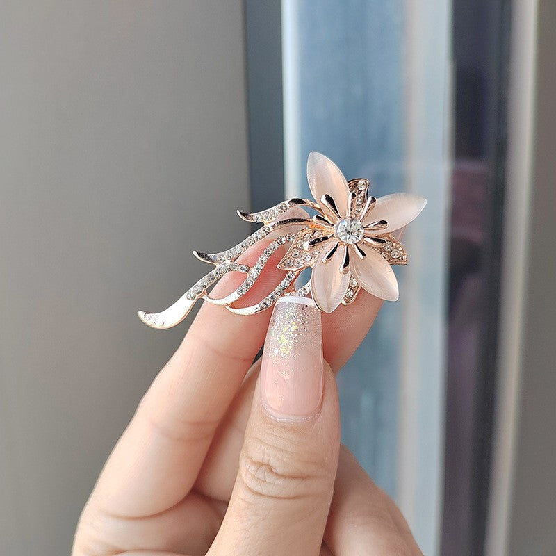 Close-up of the vintage crystal flower pin