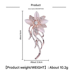Various angles of the floral brooch