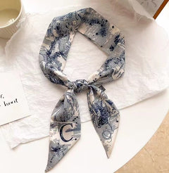 satin scarf styled around hair