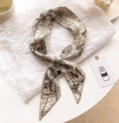 satin scarf styled around hair