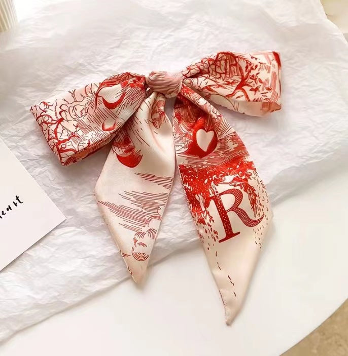 floral satin scarf laid flat