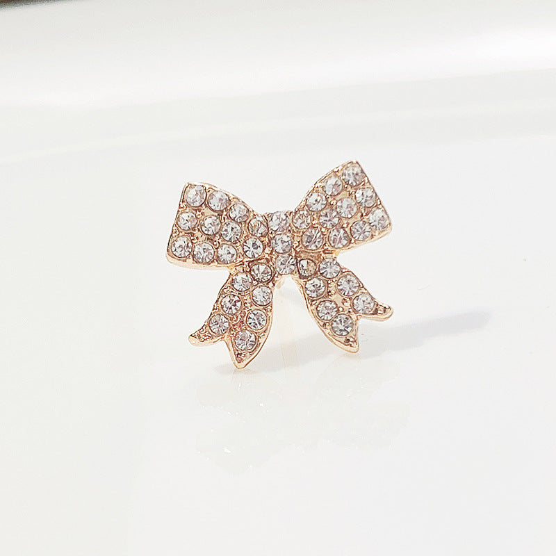 Image of anti-slip clover leaf brooch with cat eye stone