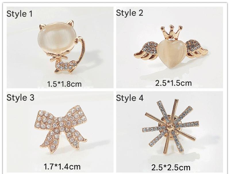 Fashionable cat eye stone brooch with unique designs
